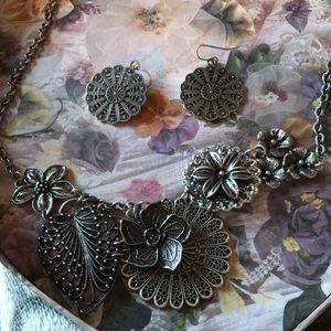 Premier design necklace and earrings.